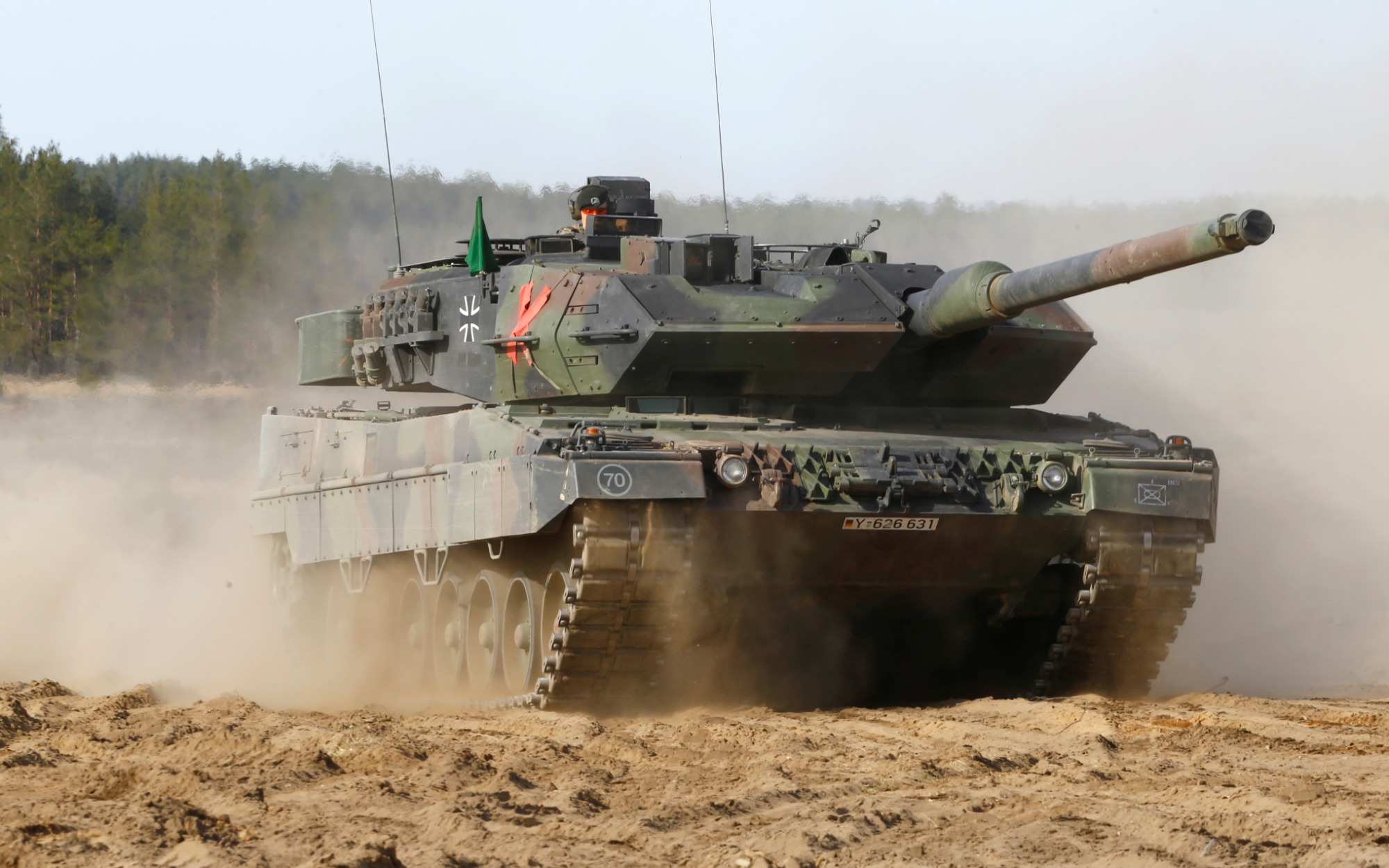 Leopard 2 tank conducting an encirclement during Winter Camp exercises